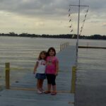 children on dock